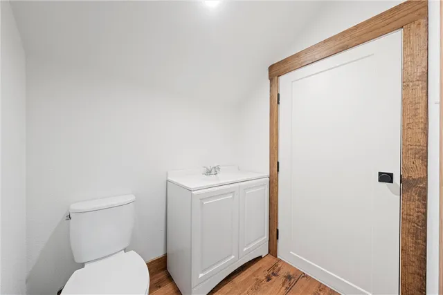 a bathroom with a toilet and a sink