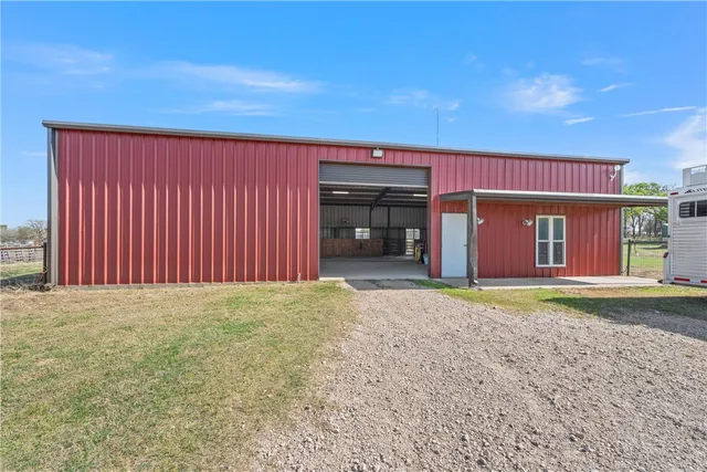 front view of a building with a yard
