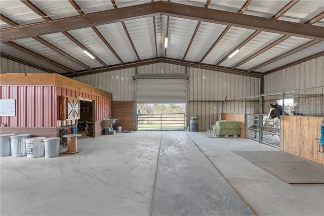 a view of a room with wooden walls