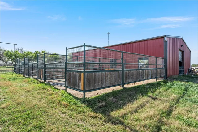a view of balcony with wooden floor