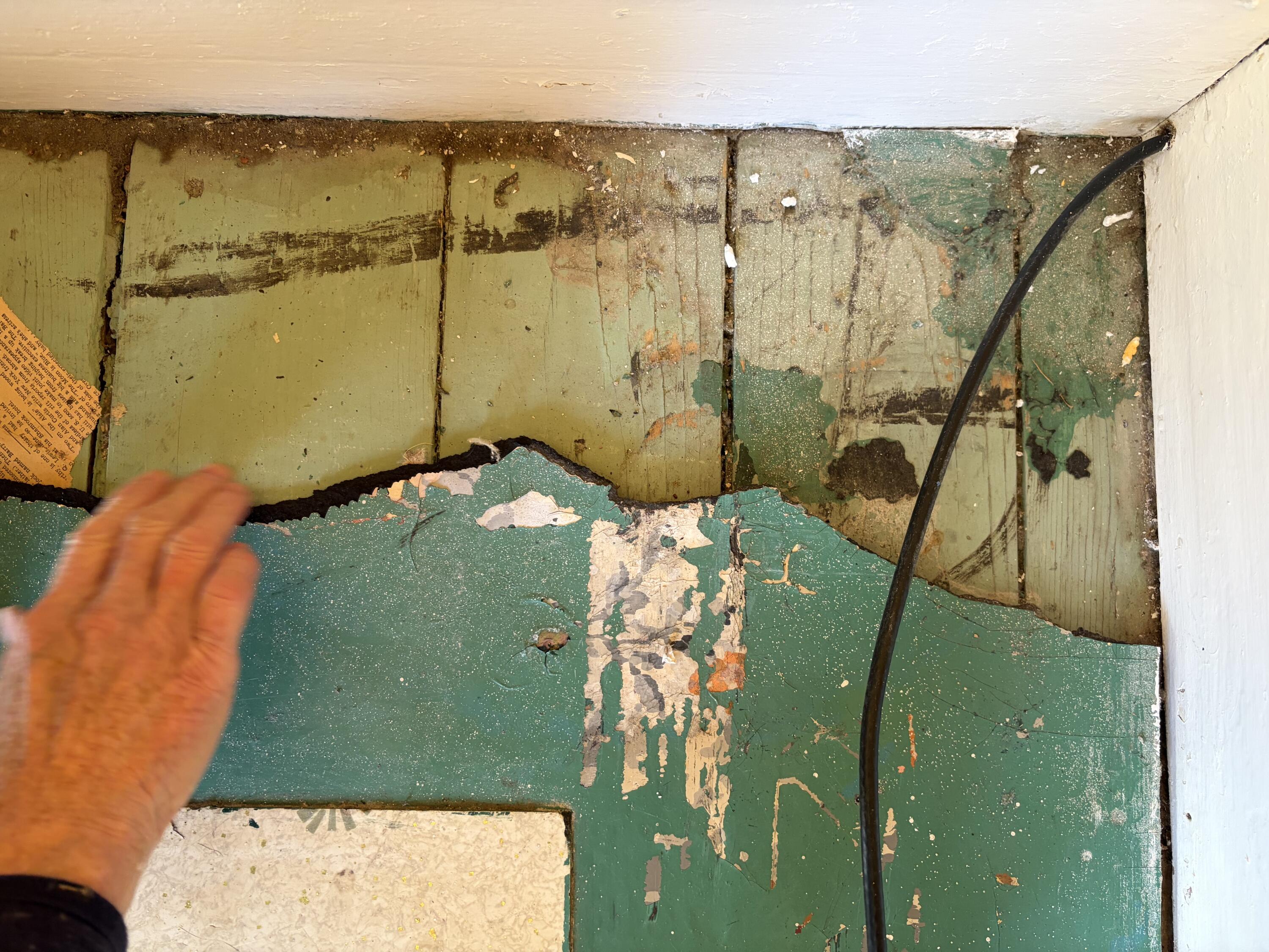 11 Cottage Street Vinalhaven, ME 04863 - Photo 17 of 27 Wooden Floor Beneath Linoleum Upstairs