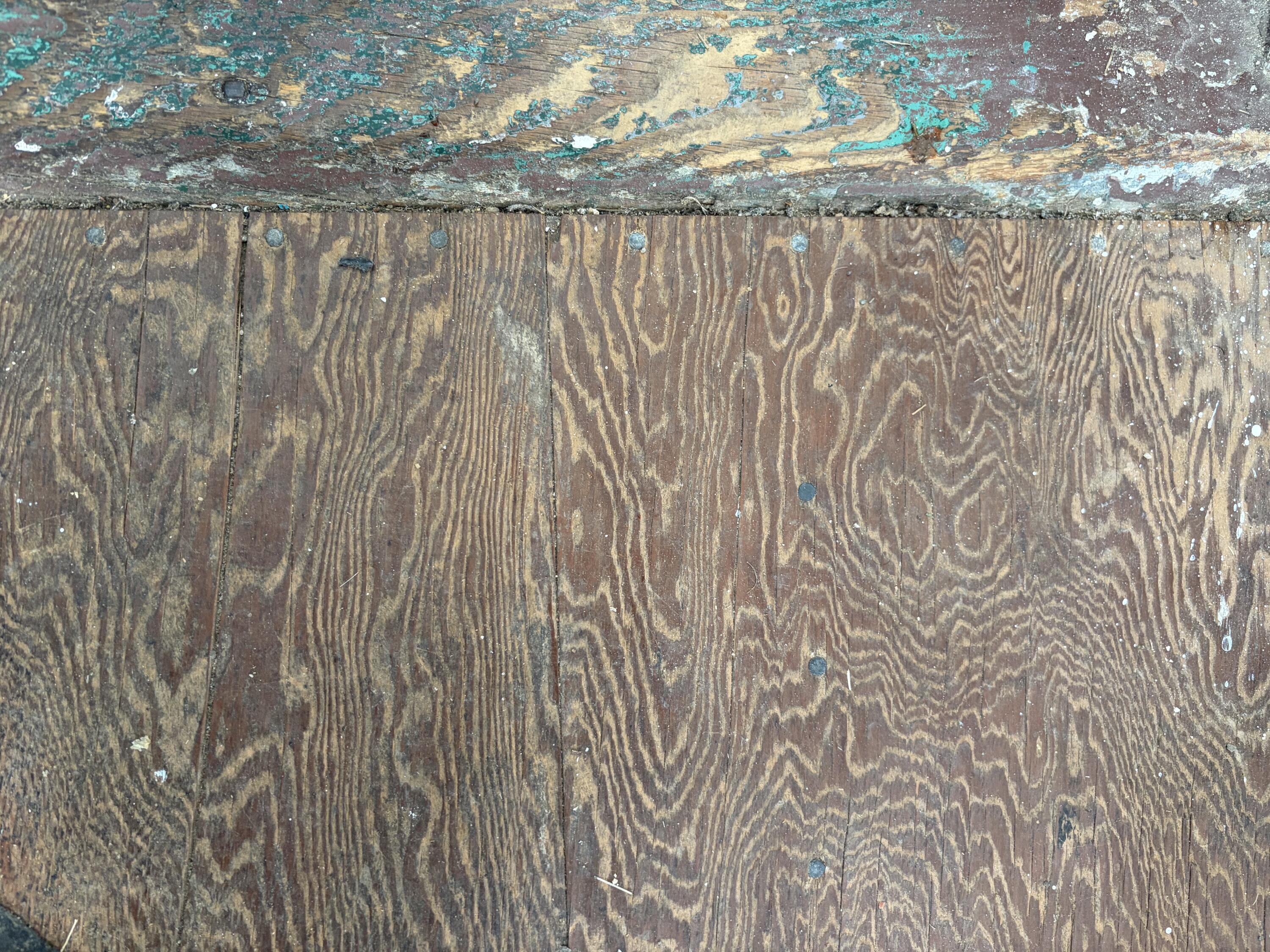 11 Cottage Street Vinalhaven, ME 04863 - Photo 18 of 27 Wooden Floor Beneath Linoleum Downstairs