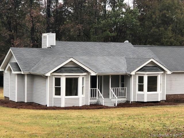5512 Griffith Road Monroe, NC 28112 - Photo 2 of 36 a front view of a house with a yard