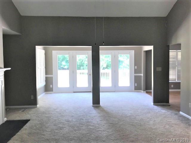 5512 Griffith Road Monroe, NC 28112 - Photo 15 of 36 a view of empty room with floor to ceiling window