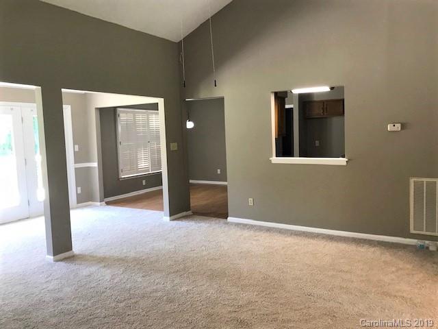 5512 Griffith Road Monroe, NC 28112 - Photo 16 of 36 a view of an empty room with closet and a window
