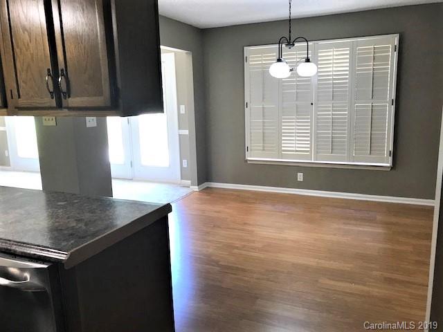 5512 Griffith Road Monroe, NC 28112 - Photo 19 of 36 a view of a kitchen with a sink cabinets and a window