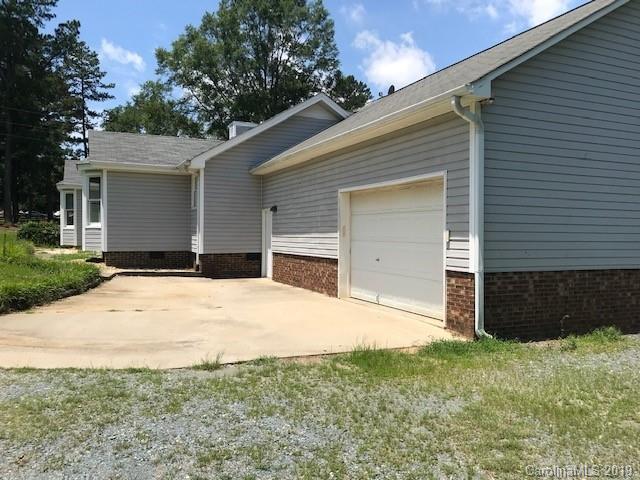 5512 Griffith Road Monroe, NC 28112 - Photo 3 of 36 a front view of house with yard
