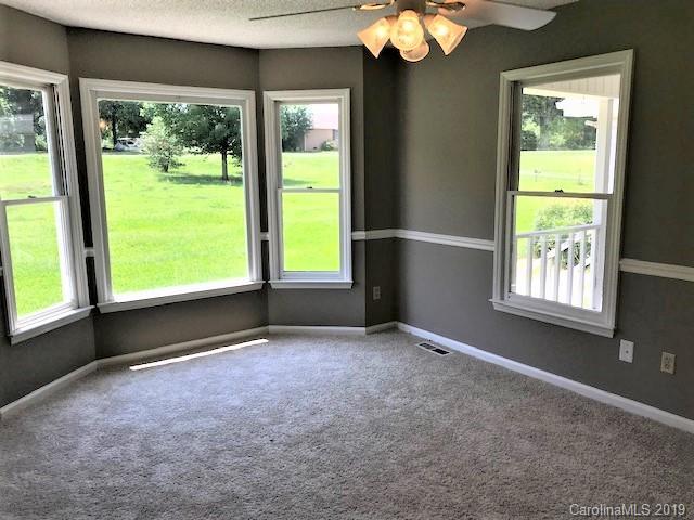 5512 Griffith Road Monroe, NC 28112 - Photo 22 of 36 an empty room with windows
