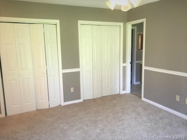5512 Griffith Road Monroe, NC 28112 - Photo 24 of 36 an empty room with windows and closet