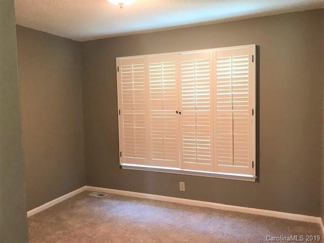 5512 Griffith Road Monroe, NC 28112 - Photo 28 of 36 a view of an empty room with a window