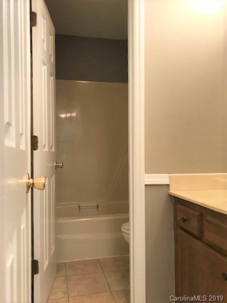 5512 Griffith Road Monroe, NC 28112 - Photo 29 of 36 a bathroom with a bathtub