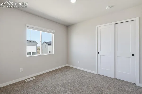 a view of storage and utility room with washer and dryer