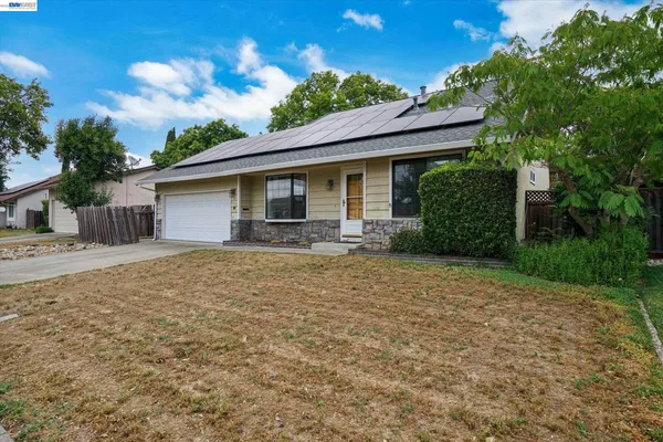 a front view of house with yard