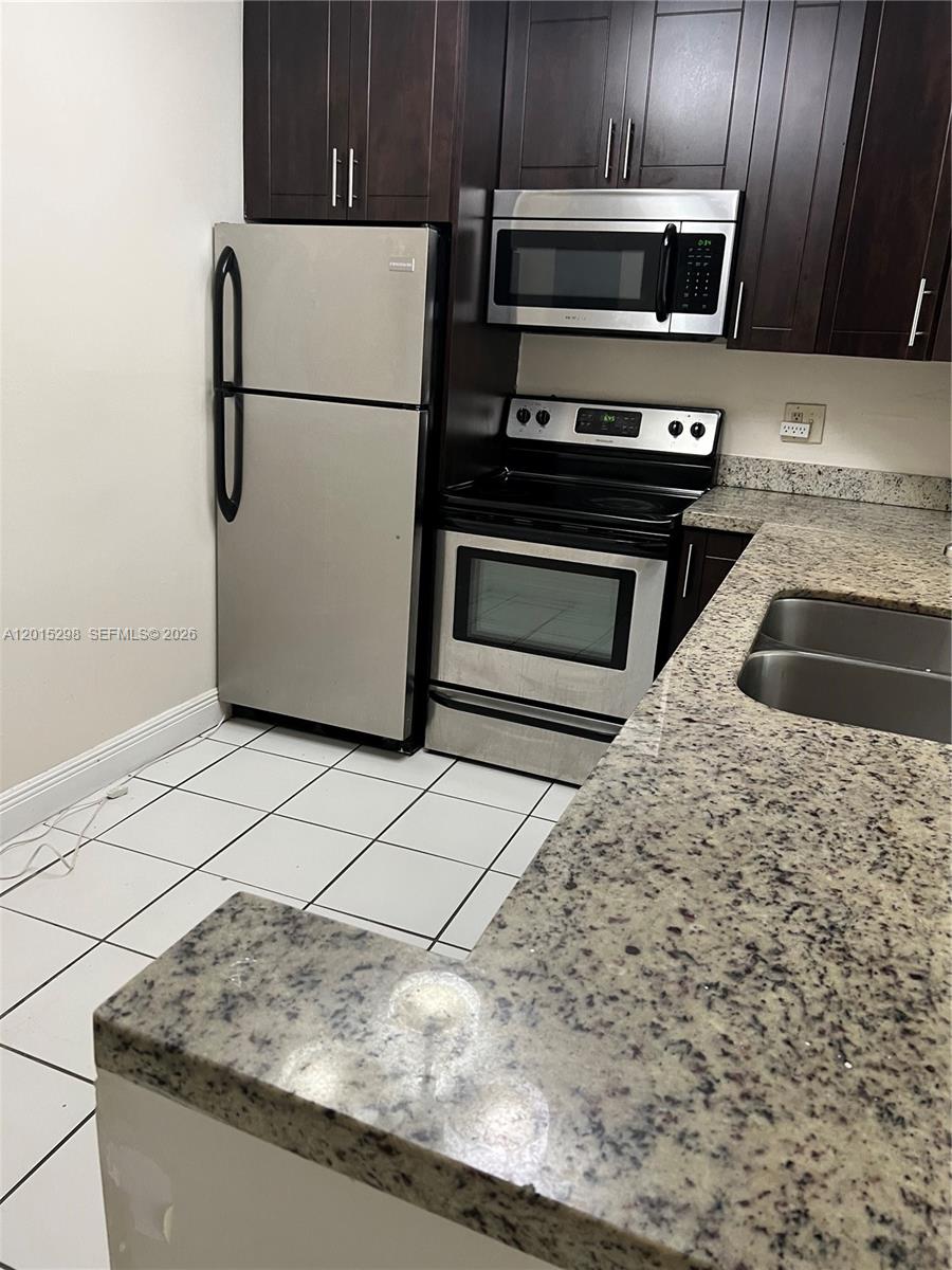8307 Southwest 142nd Avenue, Unit F103 Miami, FL 33183 - Photo 1 of 11