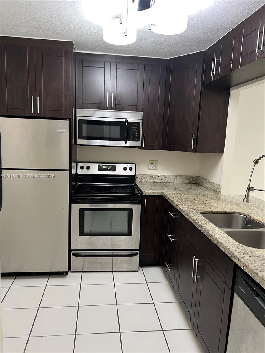 8307 Southwest 142nd Avenue, Unit F103 Miami, FL 33183 - Photo 4 of 11