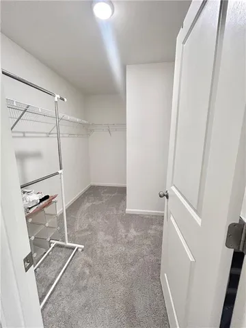 a view of a room with rack on the wall