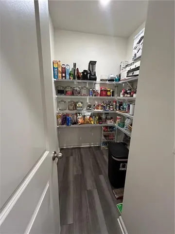 a room with storage and utility