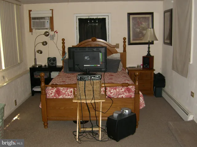 a room with a chair and window