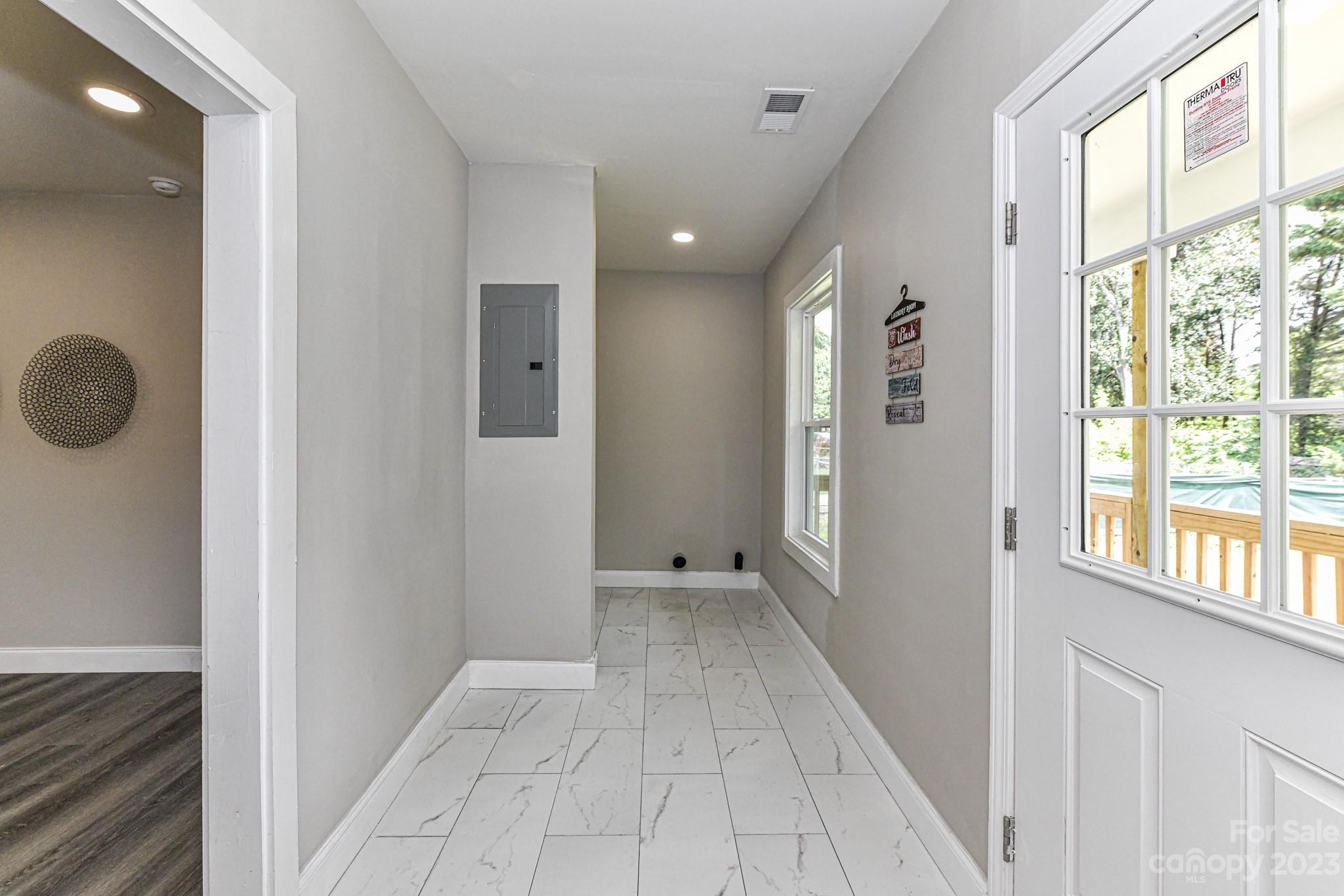 1420 Rhodes Rhyne Road Lincolnton, NC 28092 - Photo 19 of 25 a view of a hallway with windows and entryway