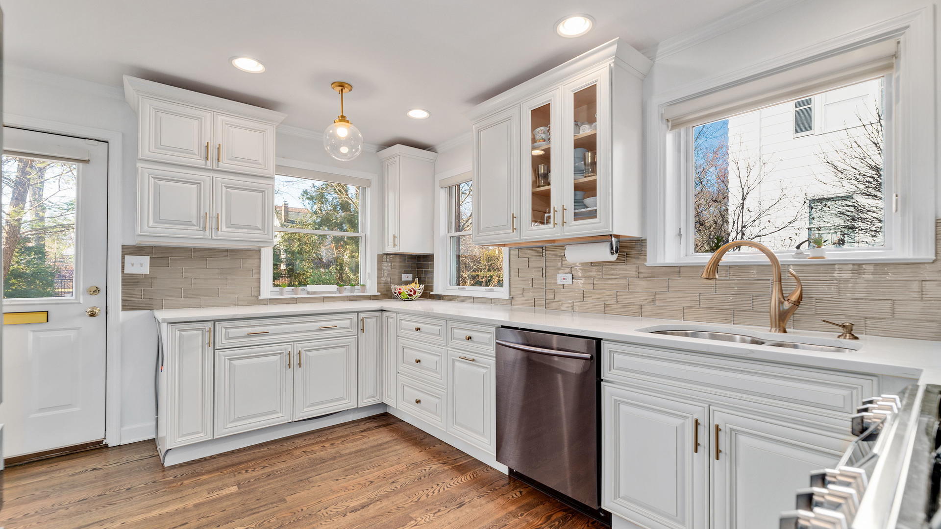 105 Ravine Road Hinsdale, IL 60521 - Photo 11 of 35 a kitchen with a sink cabinets and window
