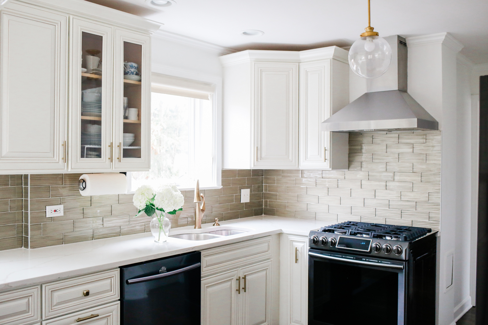 105 Ravine Road Hinsdale, IL 60521 - Photo 12 of 35 a kitchen with a sink stove and cabinets