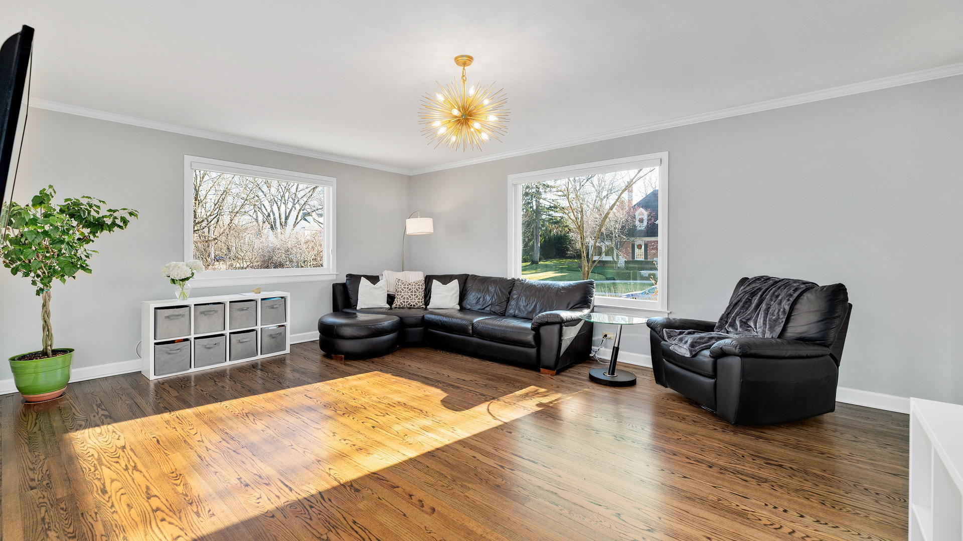 105 Ravine Road Hinsdale, IL 60521 - Photo 17 of 35 a living room with furniture and a chandelier
