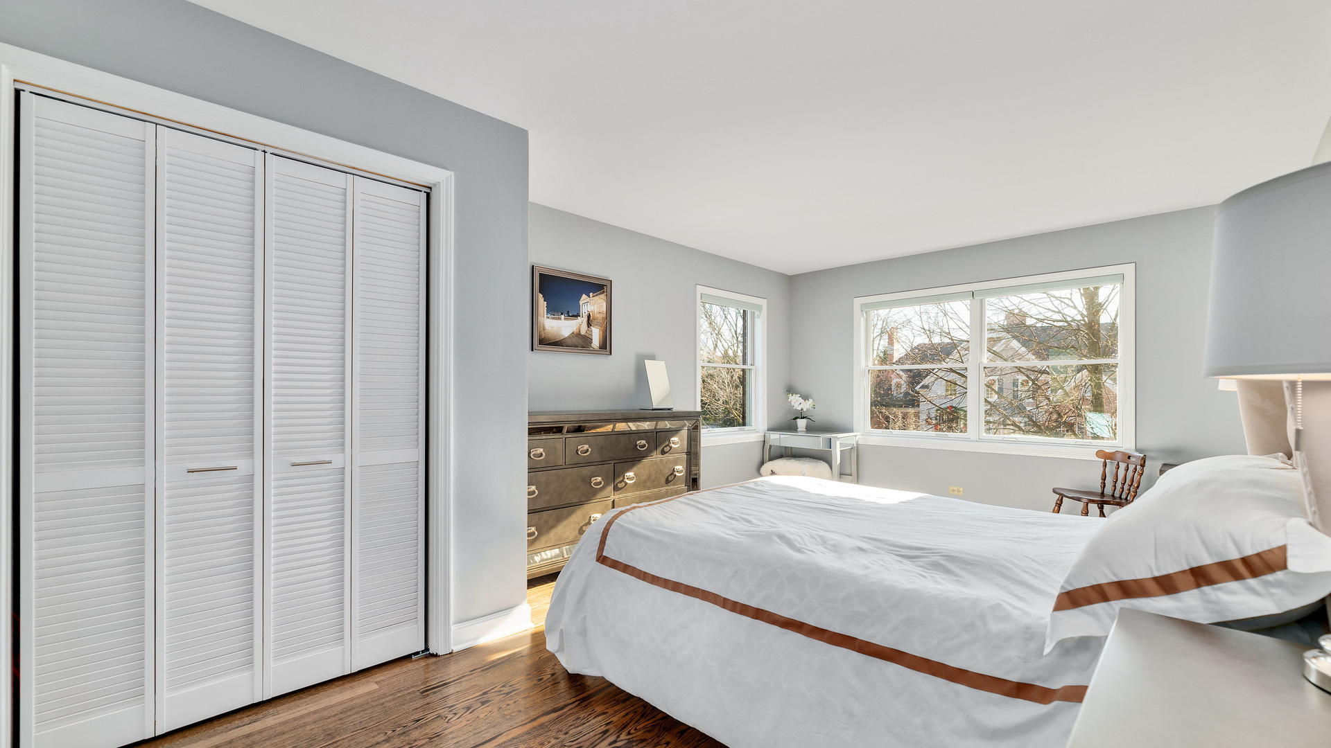 105 Ravine Road Hinsdale, IL 60521 - Photo 22 of 35 a bedroom with a bed and a large window