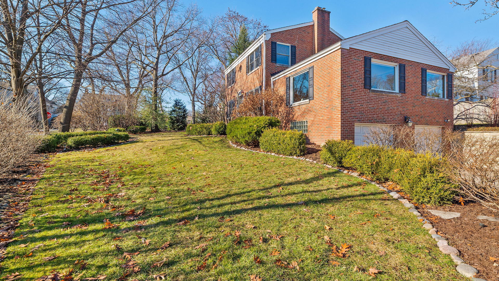 105 Ravine Road Hinsdale, IL 60521 - Photo 32 of 35 a front view of a house with a yard