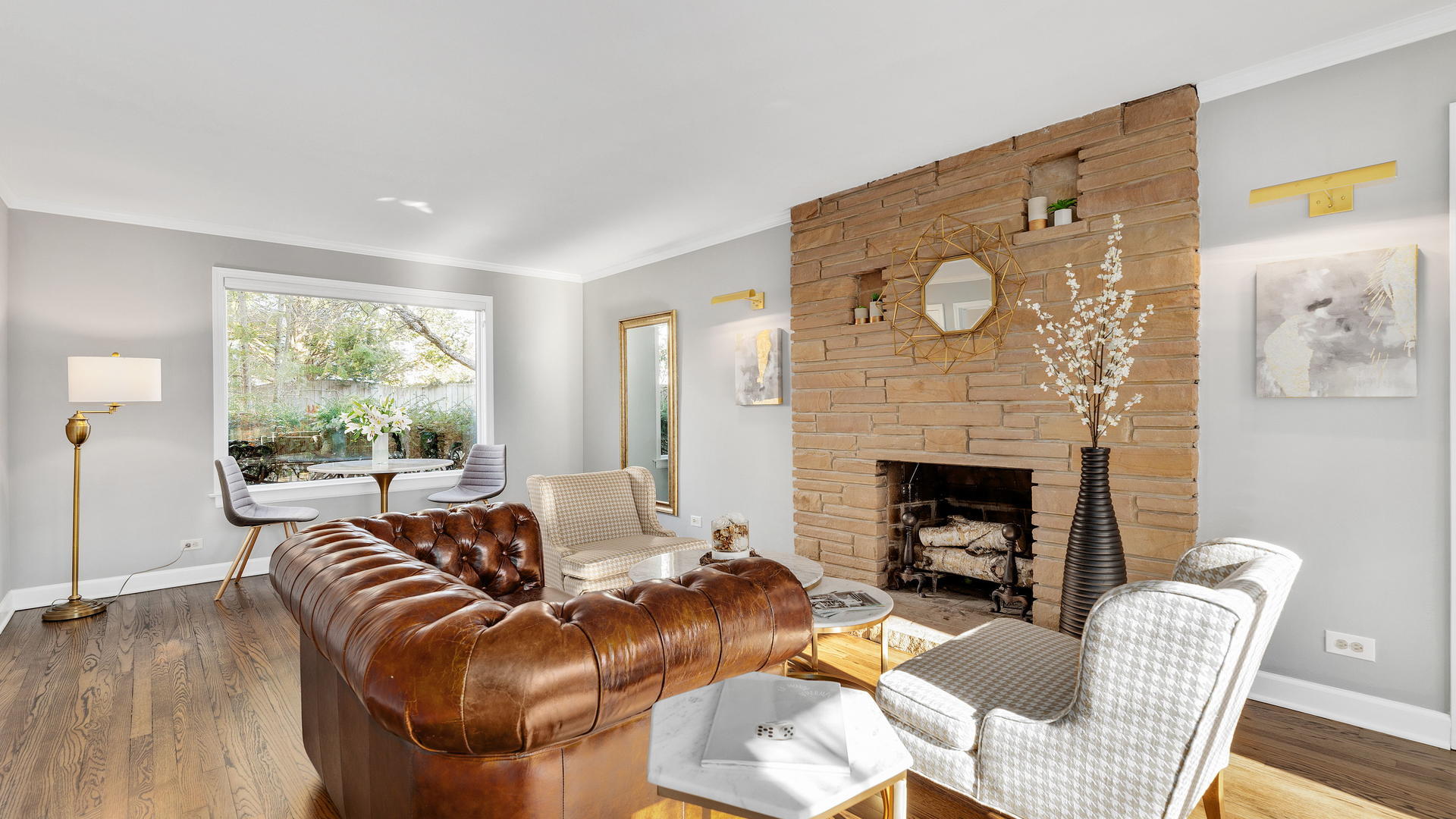 105 Ravine Road Hinsdale, IL 60521 - Photo 7 of 35 a living room with furniture a fireplace and a large window