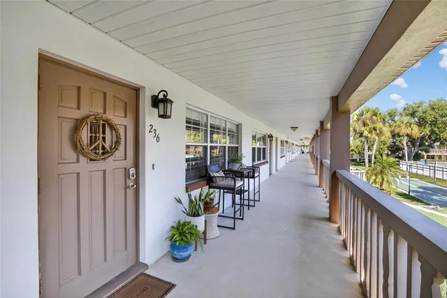 a view of a porch with furniture