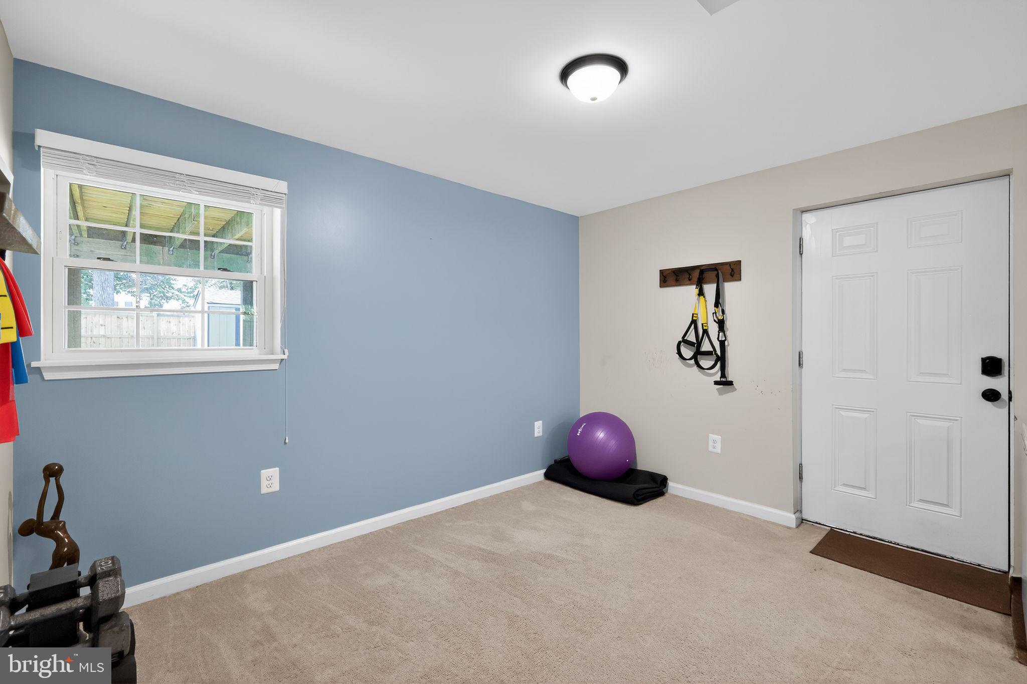 3813 8th Street North Beach, MD 20714 - Photo 17 of 30 Living Space Downstairs