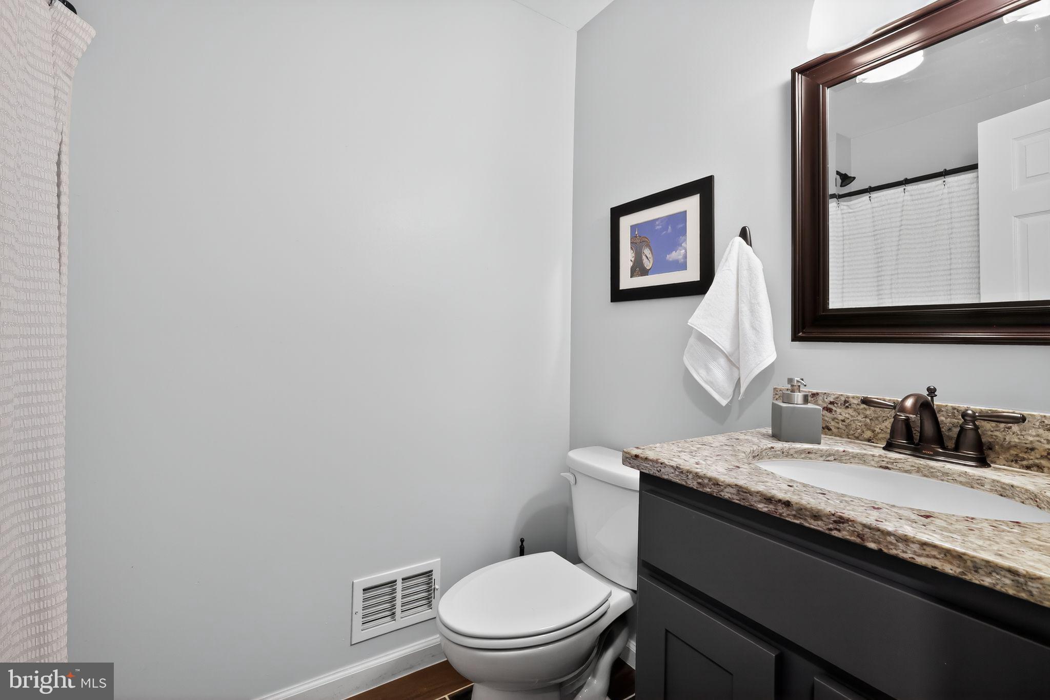 3813 8th Street North Beach, MD 20714 - Photo 10 of 30 Upstairs Hall Full Bathroom