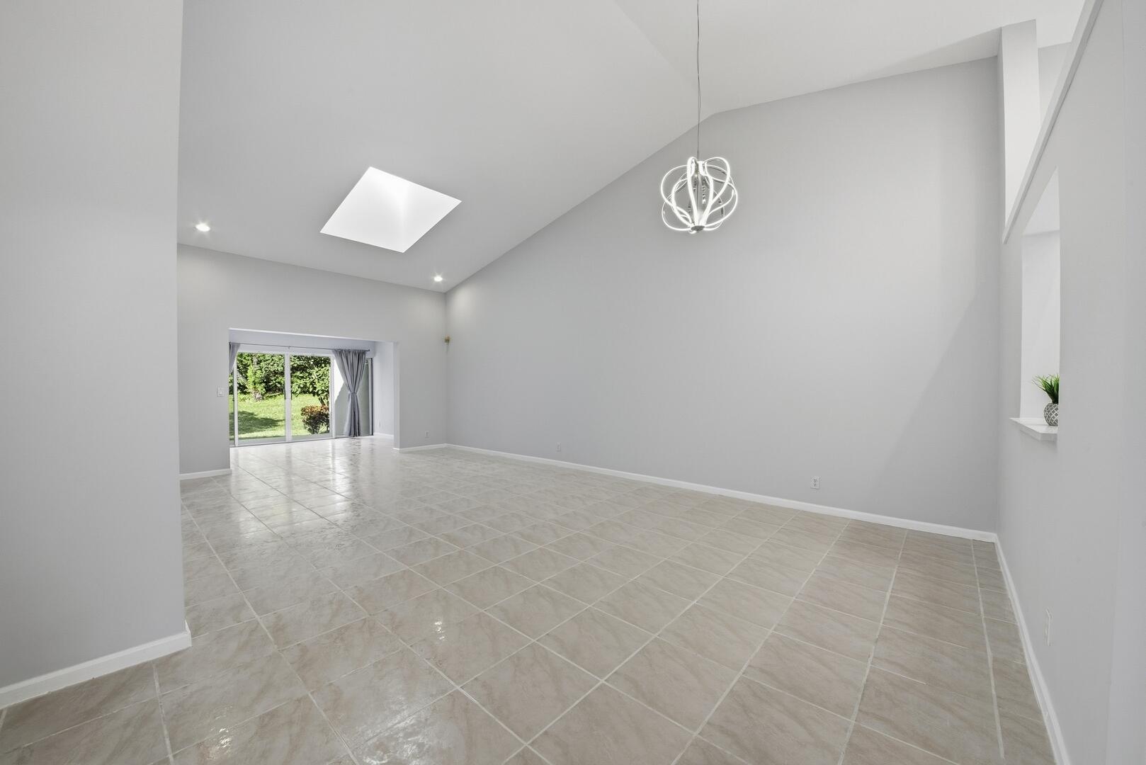 7617 Island Breeze Terrace Boynton Beach, FL 33437 - Photo 14 of 46 an empty room with windows and closet