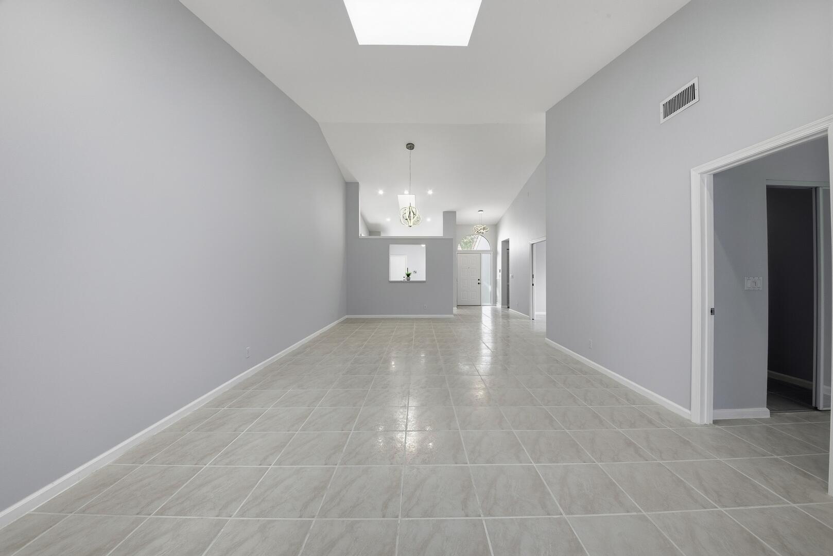 7617 Island Breeze Terrace Boynton Beach, FL 33437 - Photo 24 of 46 a view of a hallway with an entryway
