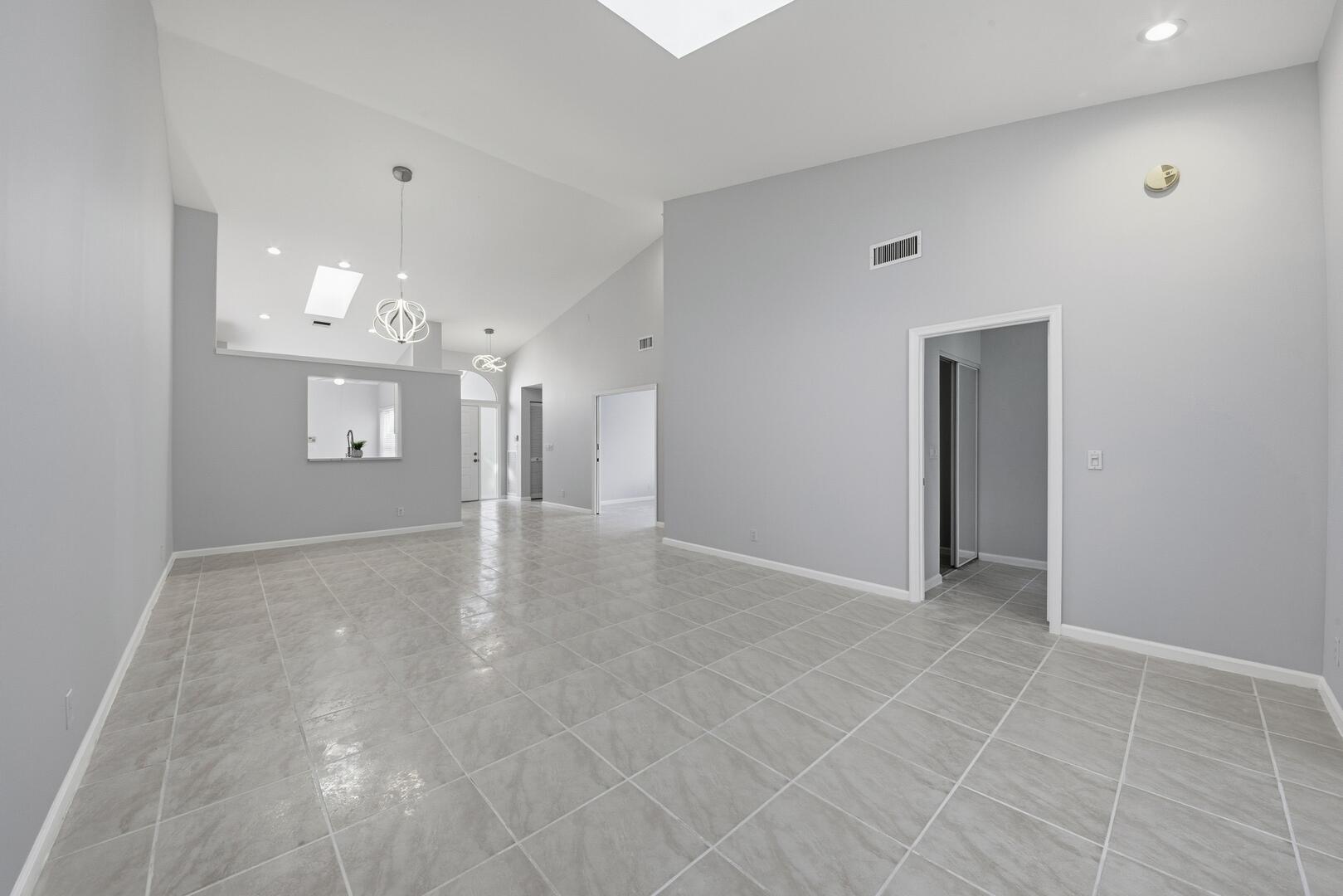 7617 Island Breeze Terrace Boynton Beach, FL 33437 - Photo 25 of 46 a view of a hallway with wooden shelves