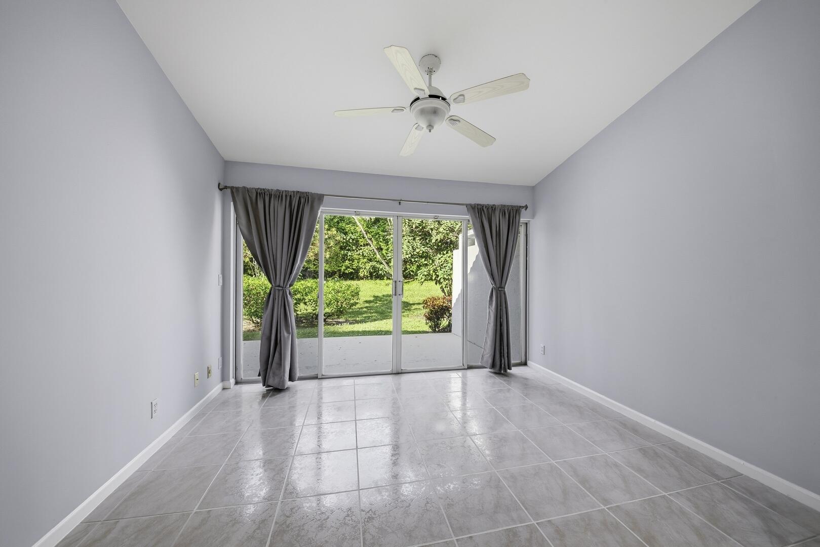 7617 Island Breeze Terrace Boynton Beach, FL 33437 - Photo 30 of 46 a view of an empty room with a window
