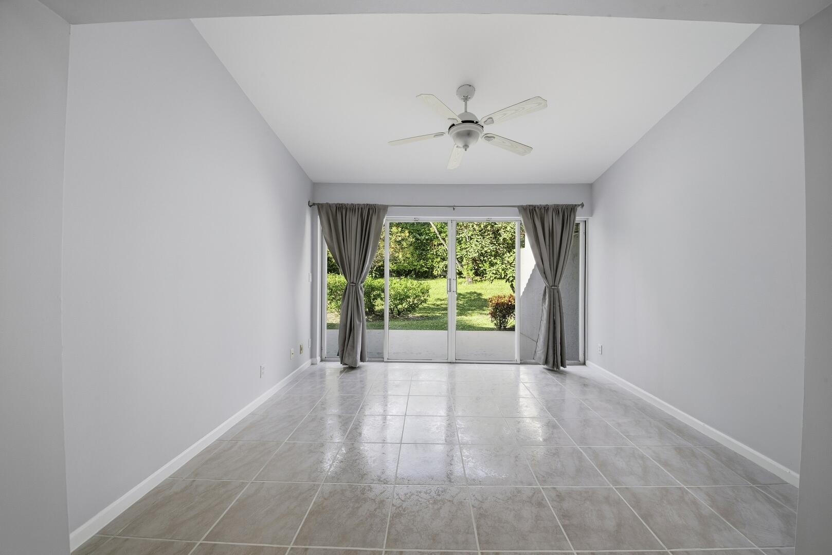 7617 Island Breeze Terrace Boynton Beach, FL 33437 - Photo 31 of 46 a view of an empty room with a window
