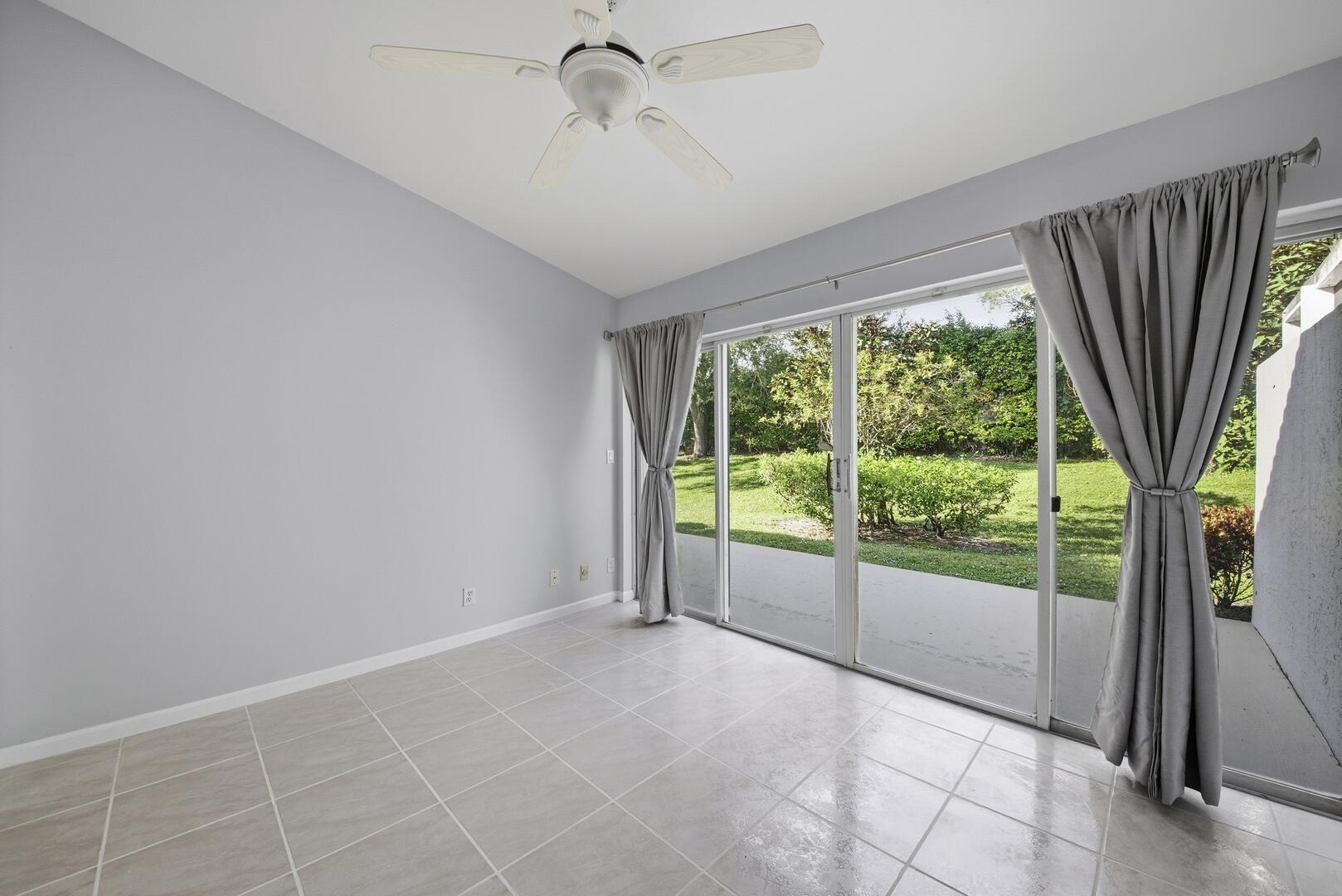 7617 Island Breeze Terrace Boynton Beach, FL 33437 - Photo 33 of 46 a view of a room with a large window