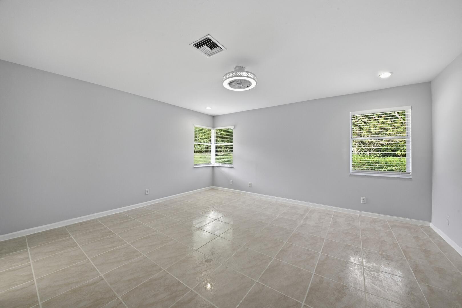 7617 Island Breeze Terrace Boynton Beach, FL 33437 - Photo 34 of 46 a view of an empty room with a window