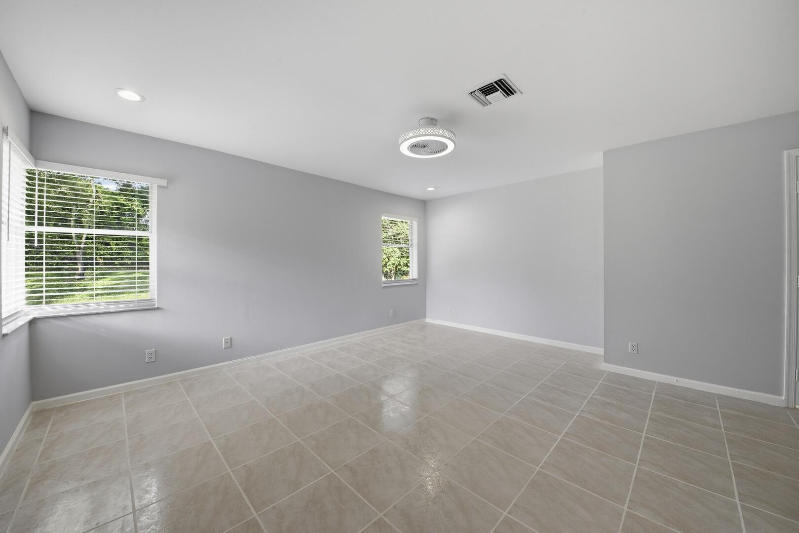 7617 Island Breeze Terrace Boynton Beach, FL 33437 - Photo 35 of 46 a view of an empty room with a window