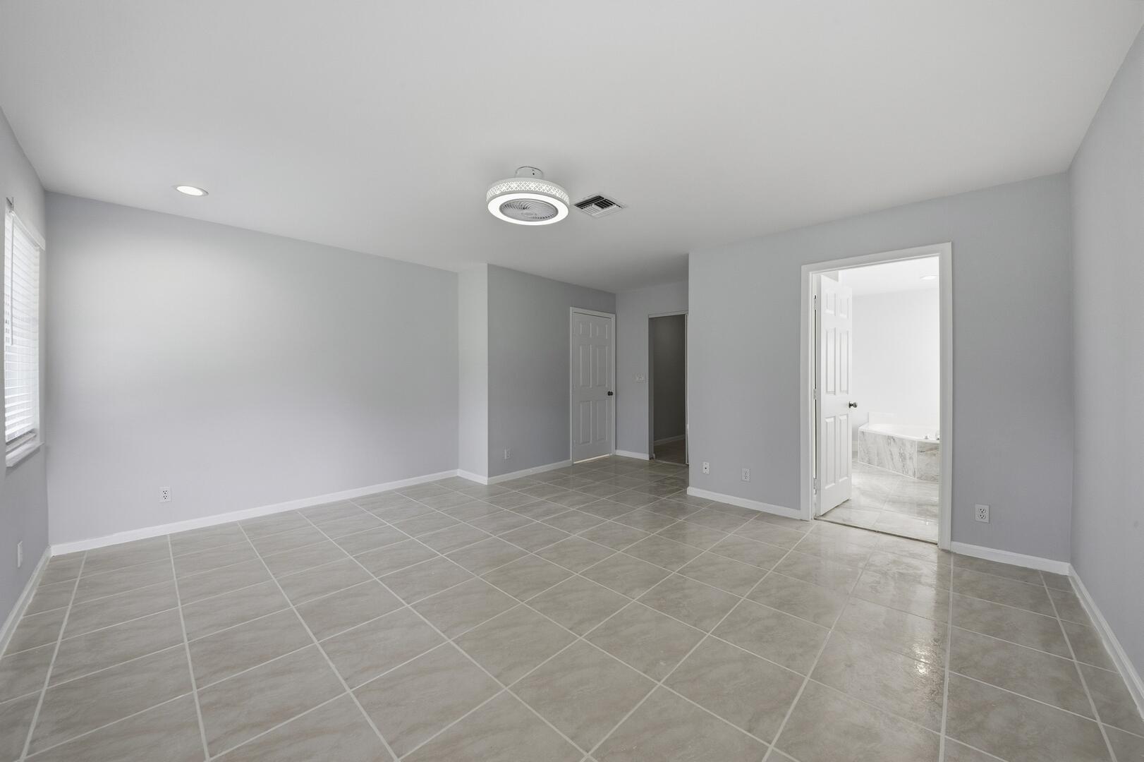 7617 Island Breeze Terrace Boynton Beach, FL 33437 - Photo 36 of 46 a view of an empty room with a window