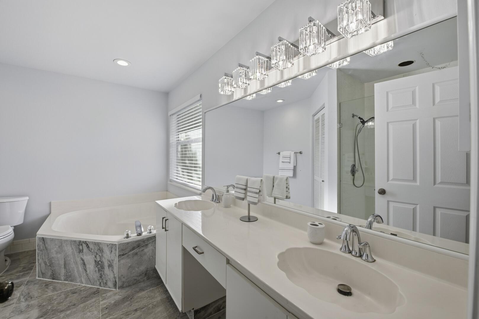 7617 Island Breeze Terrace Boynton Beach, FL 33437 - Photo 38 of 46 a bathroom with a sink a toilet and a mirror