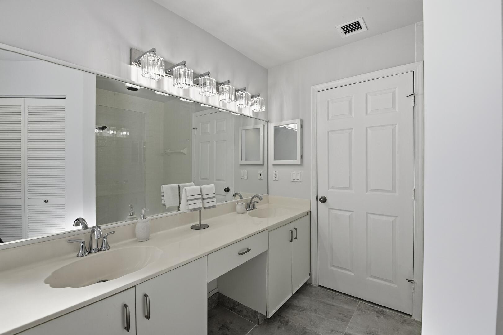 7617 Island Breeze Terrace Boynton Beach, FL 33437 - Photo 40 of 46 a bathroom with a double vanity sink mirror and