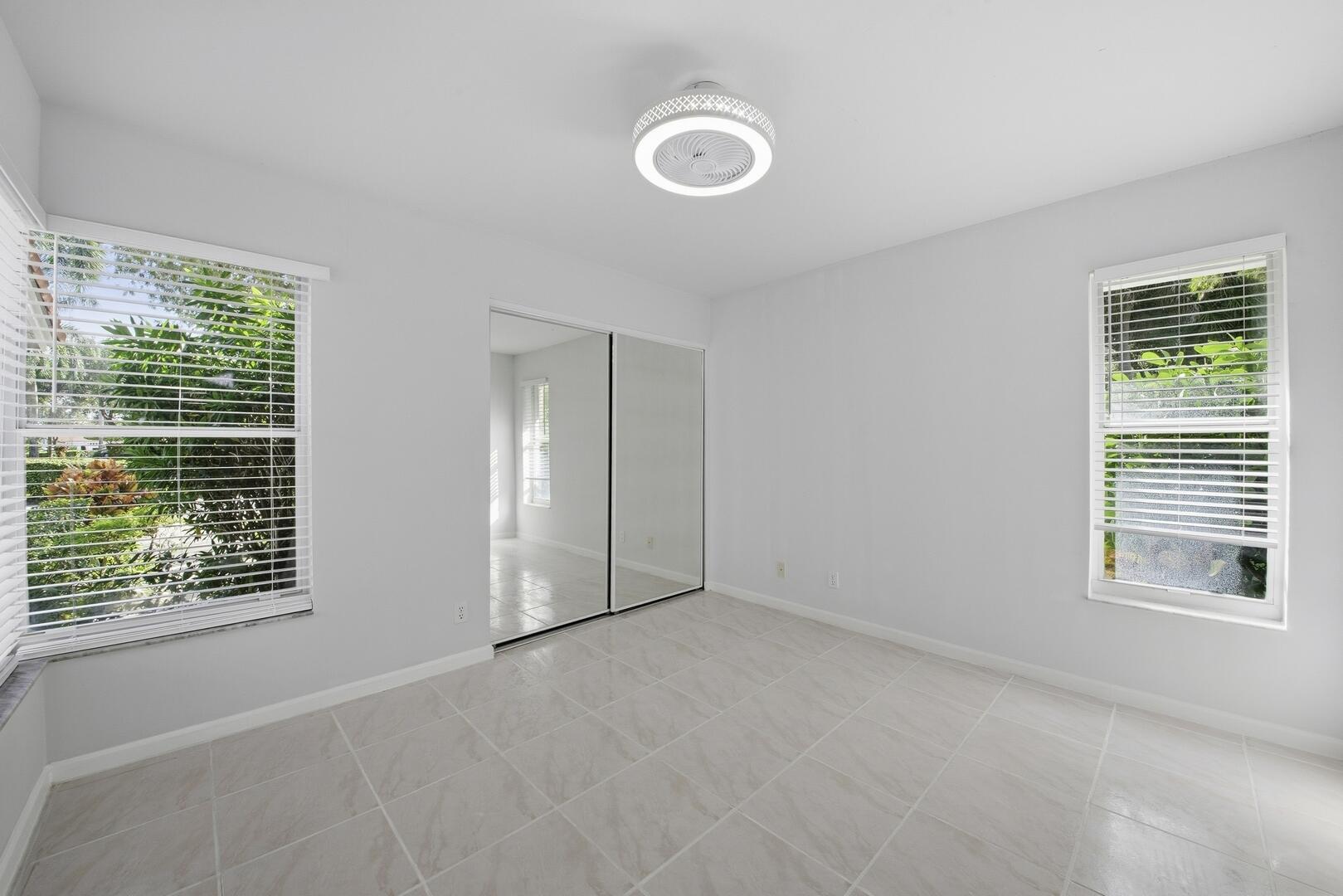 7617 Island Breeze Terrace Boynton Beach, FL 33437 - Photo 4 of 46 a view of an empty room with a window