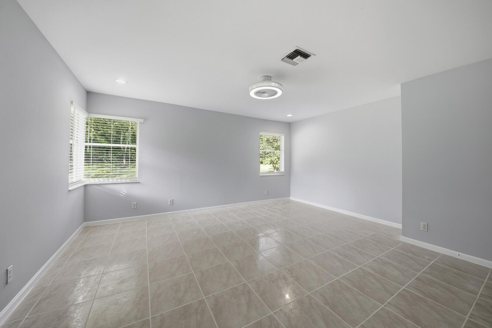 7617 Island Breeze Terrace Boynton Beach, FL 33437 - Photo 42 of 46 a view of an empty room with a window