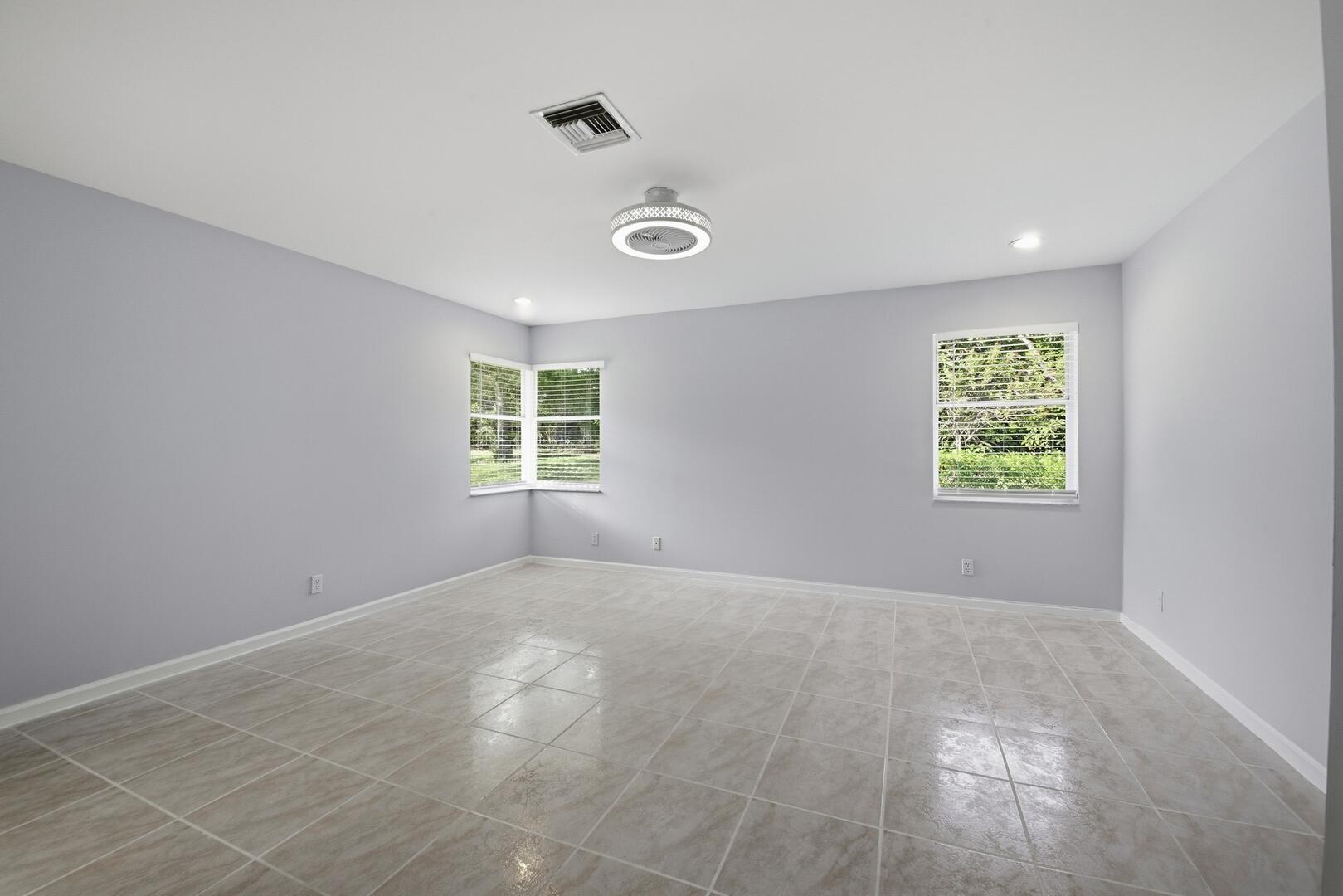 7617 Island Breeze Terrace Boynton Beach, FL 33437 - Photo 43 of 46 a view of an empty room with a window