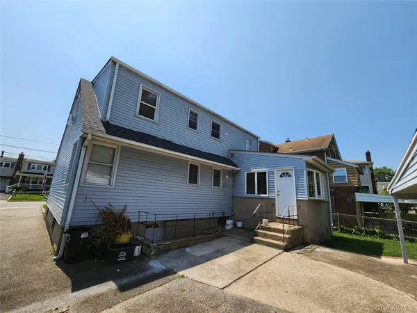 a front view of house with yard