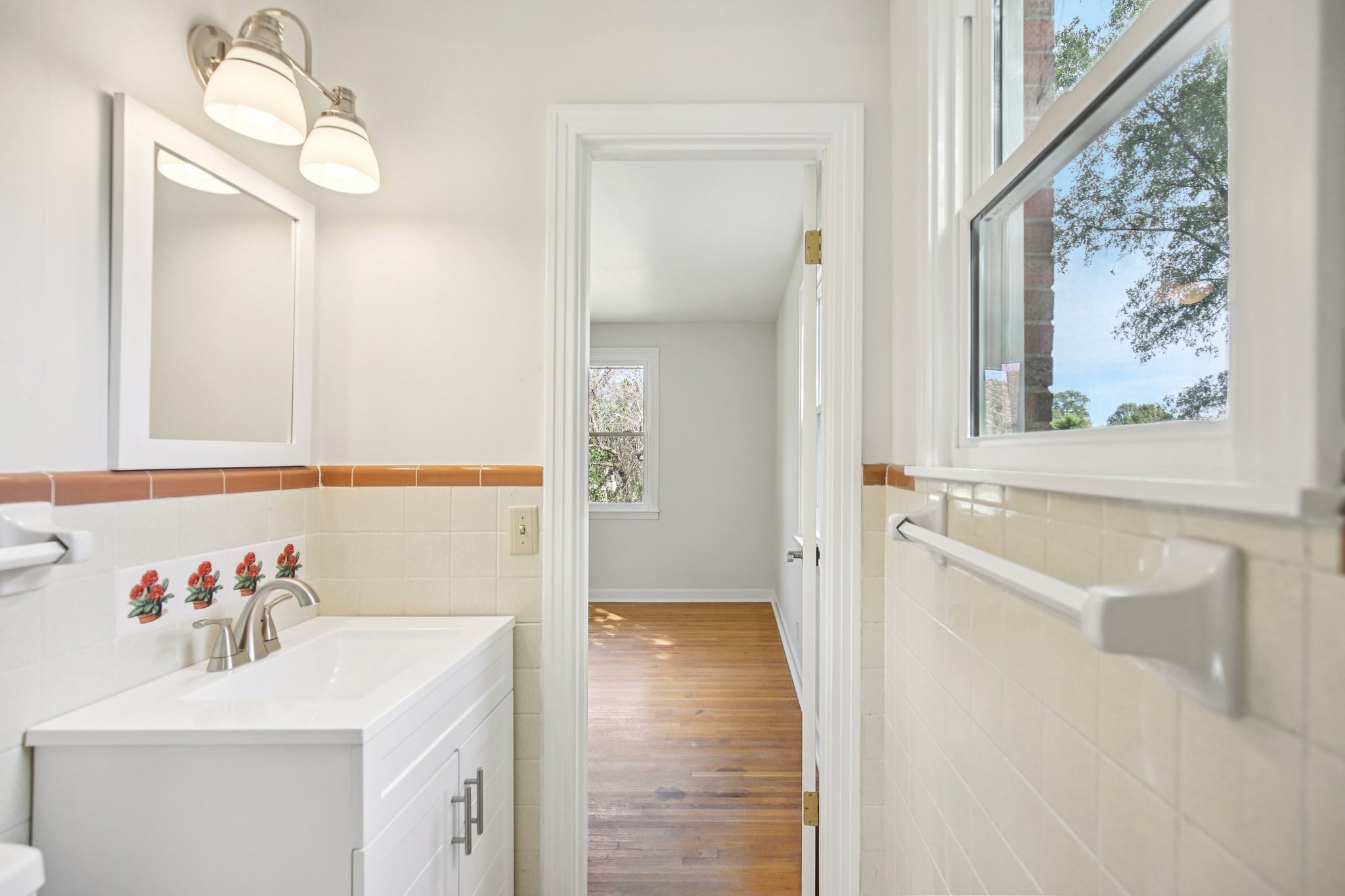 2411 Cloverdale Road Nashville, TN 37214 - Photo 18 of 33 a bathroom with a sink and a mirror