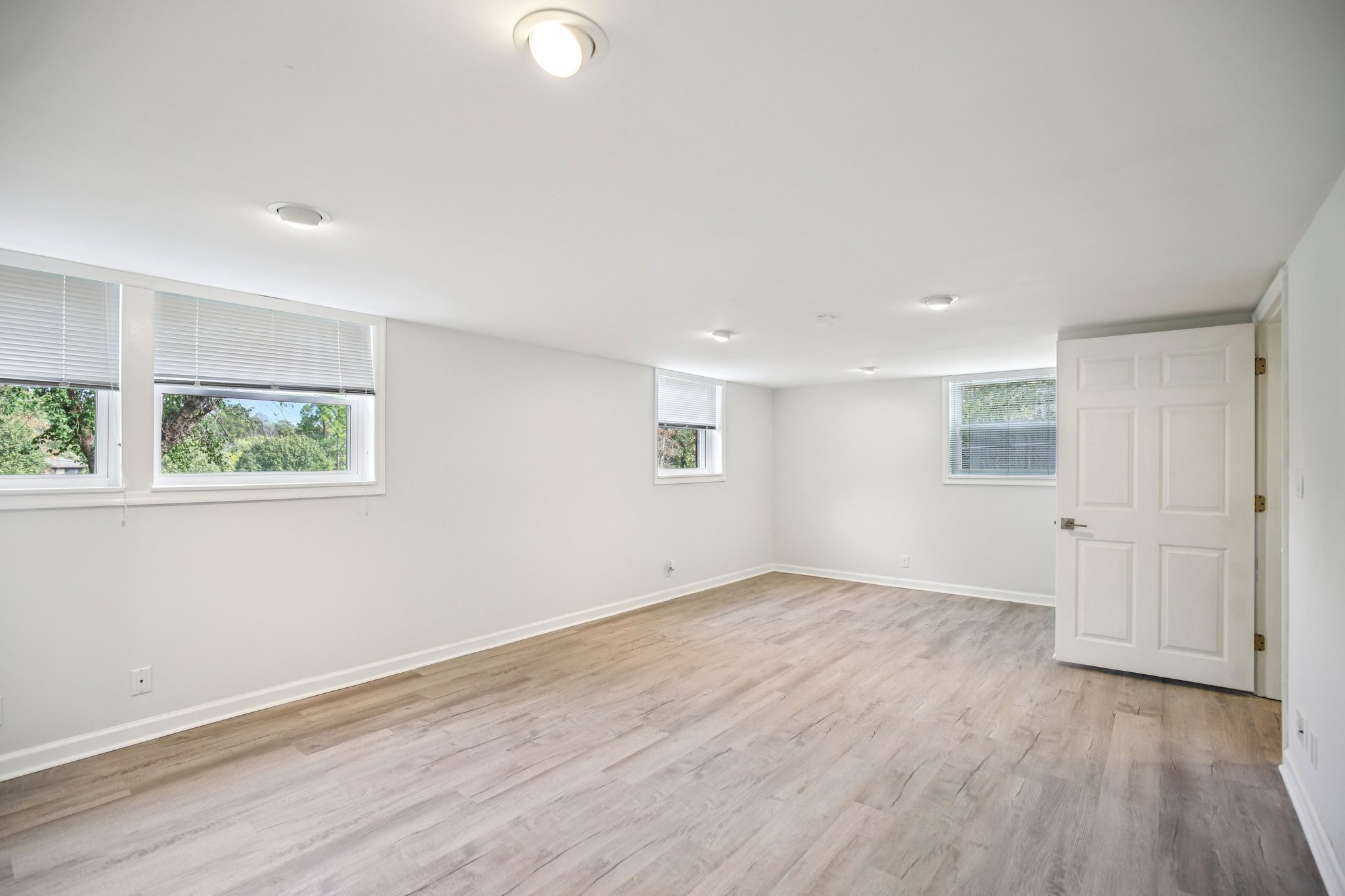 2411 Cloverdale Road Nashville, TN 37214 - Photo 26 of 33 an empty room with wooden floor and windows