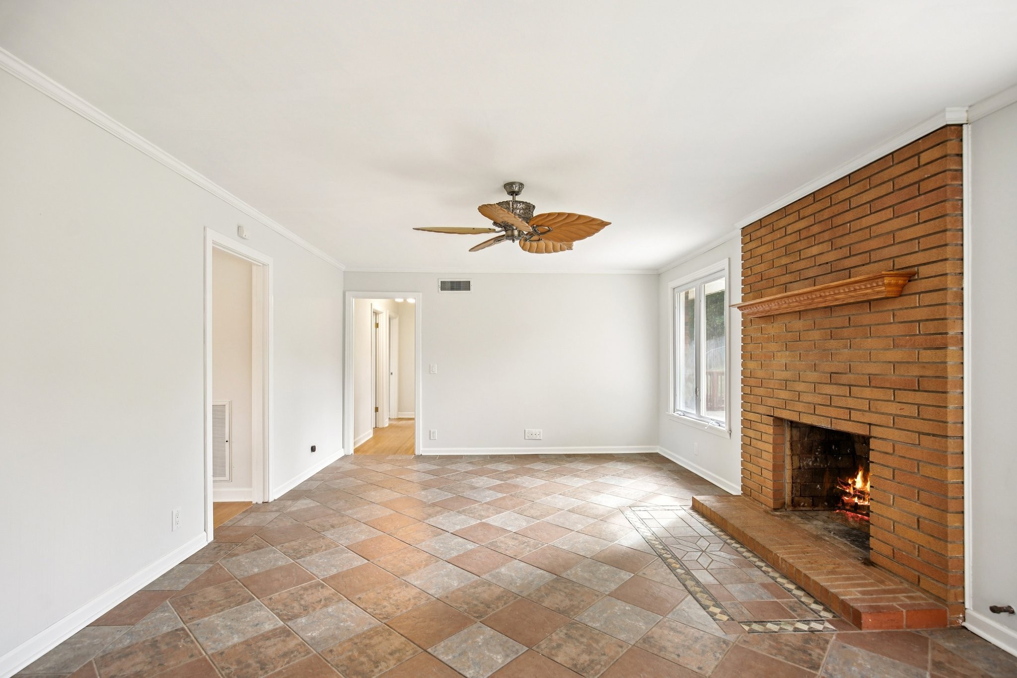 2411 Cloverdale Road Nashville, TN 37214 - Photo 8 of 33 a view of an empty room with a fireplace